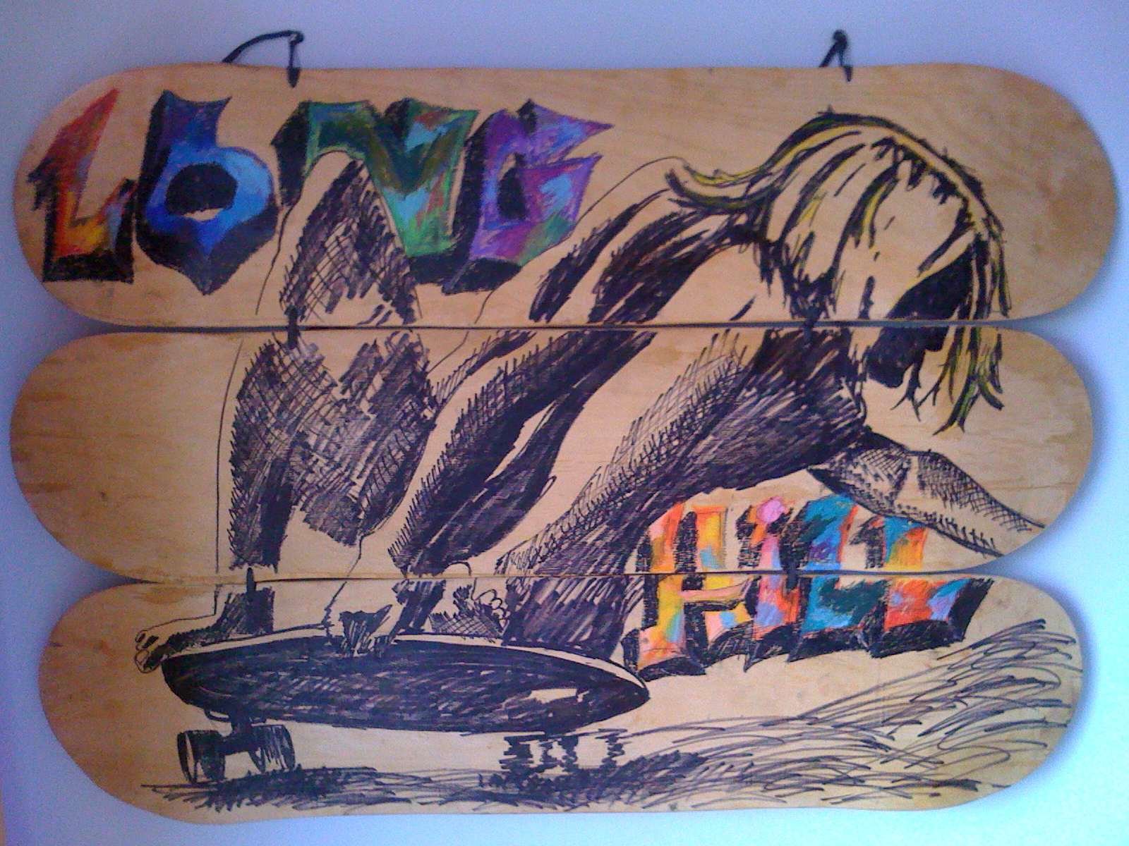 Shape de 2009 com a arte LONGHILL desenhada à mão