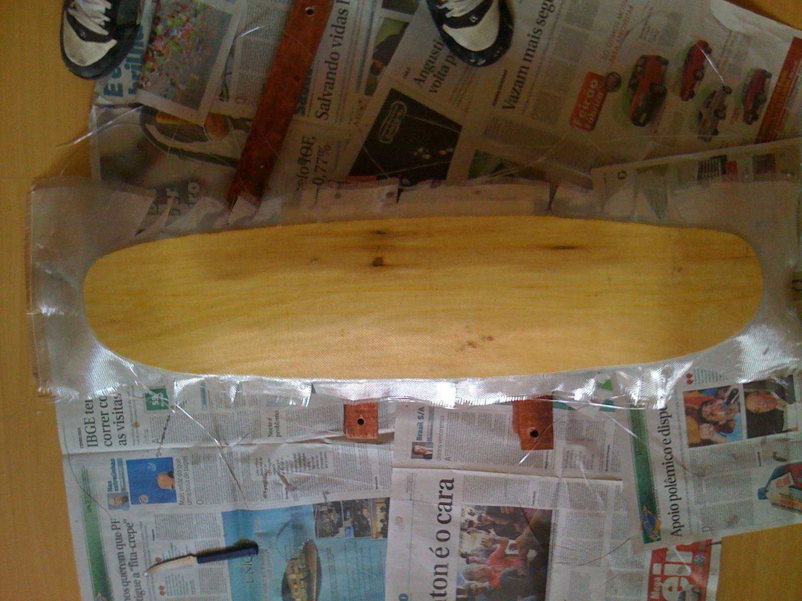 Shape na prensa, forrado com jornal